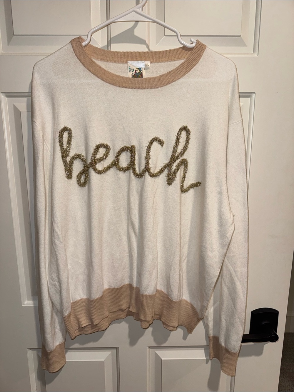 QUEEN OF SPARKLES Cream Crewneck Sweater with Tan Trim and Gold 'beach' Script